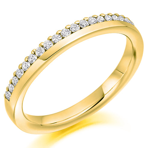 Ladies round brilliant offset claw set diamond wedding ring
